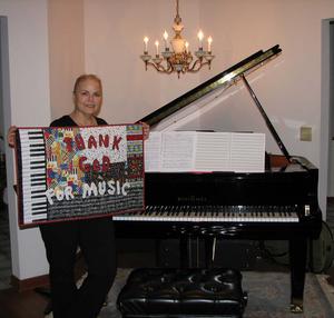 Evelyn Pursley-Kopitzke's motto is "Thank God for Music." That phrase is emblazoned on a quilt made by her friend, Sandee Sanders.