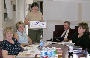 Debby Loggans of 'Round the Mountain explains a networking concept to The Tazewell County Tourism Committee.