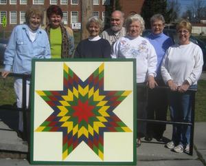 The "Lone Star" quilt square and some of the Watauga Valley Art League Members who helped create it.