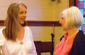 Carol Bell, right, chats with poet Felicia Mitchell after Mitchell's recent presentation, "Writing From The Heart," during the Virginia Highlands Festival in Abingdon.