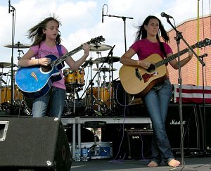 McKenna Andrews and Macy Brummit performing during the 2008 Food City Family Race Night on State Street in Bristol. (Photo by Karen Fig of Black Horse Productions)