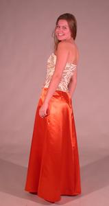 This design by Sarah Jane Walls features a beaded bodice and a flame-colored skirt.