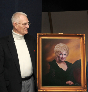 James C. "Jim" Martin with a portrait of his wife, Mary B. Martin.
