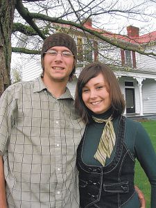 Painter Kyle Buckland and Jennifer Counts stand in front of Blue Windmill Galleries in Abingdon, Va. (Photo by Joe Tennis)