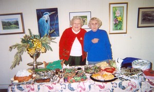 From left, Millie Woody and Nancy Camicia are all smiles at the Wednesday Morning Painters 2008 Christmas party.