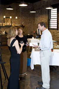 Artist Cindy Saadeh, left, chats with visitors on Kingsport's Art Crawl on Sept. 24, 2009.