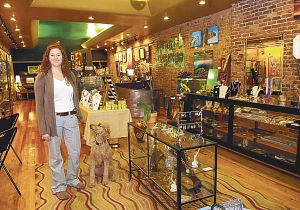 Bethany Wilson shows off the eclectic art in her gallery, the Blowfish Emporium in Bristol, Tenn. (David Crigger|Bristol Herald Courier)