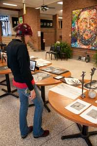 Sierra Mills enjoys the displays during "Inspire Your Heart with Art Day" at Virginia Intermont College in Bristol. (Photo by Jared Ladia). 