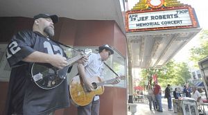 Punchin' Judy members Rick Morrell, left, and Rondal Millhorn play outside the Paramount Center for the Arts prior to the Jef Roberts Memorial Concert on April 29, 2010. (Photo by Earl Neikirk | Bristol Herald Courier)