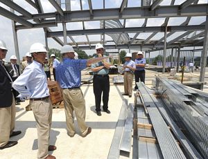 Todd Christensen, Executive Director of the Southwest Virginia Cultural Heritage Commission, led a tour of the Heartwood artisan center. (Photo by David Crigger/Bristol Herald Courier)