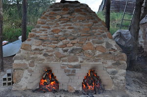 ETSU faculty members build a reproduction of an ancient Etruscan kiln in Italy