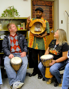 Dr. Arnold Nyarambi (center) has been holding drumming circles in Johnson City and in Kingsport.
