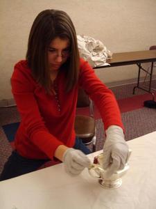 University School student Sasha Moulton learns to catalog artifacts during a job-shadowing day with Reece Museum staff.