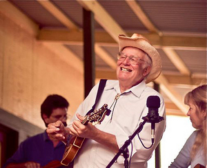 Jack Tottle is still on stage in Hawaii with his group Bluegrass Jack. Band members Chris Wej (left) and Anne Pontius (right) can be seen in the background.