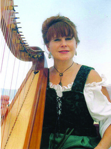 Sandra Parker with her harp.