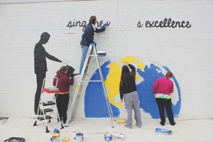Students work on a mural at Emory & Henry College.