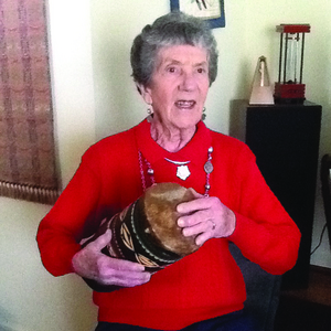 Laura Ann Warner demonstrates a rhythm for other musicians.