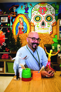 Steven Cregger in his colorful classroom. (photo by David Grace)