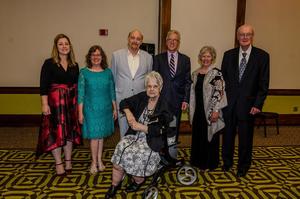 The winners of the awards are from left to right Samantha Gray, Jane DeLoach Morison, Eugene Wolf, Anita Coulthard (front), Ted Olson, Rose Marie Burriss and Bill Burriss.