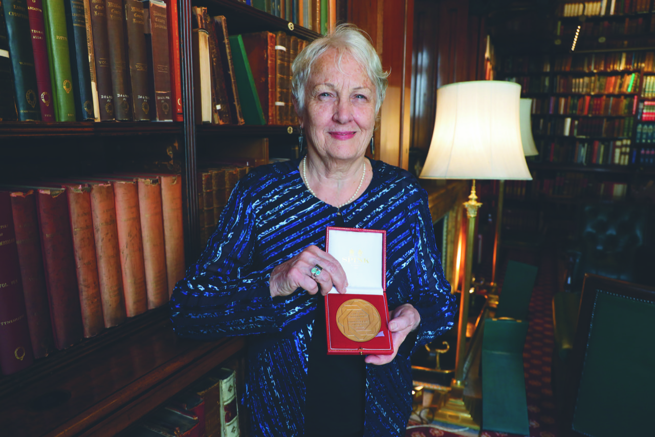 Lisa Alter with her award.