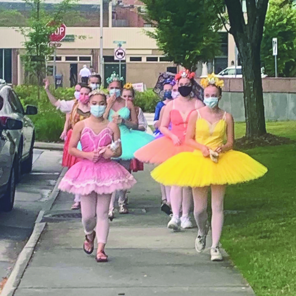 Dancers on their way to peform in the park