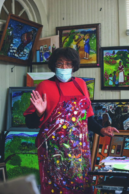 Nancy Johnson is surrounded by her mixed-media folk art in her studio at The Arts Depot, Abingdon, Virginia. (photo by David Grace)