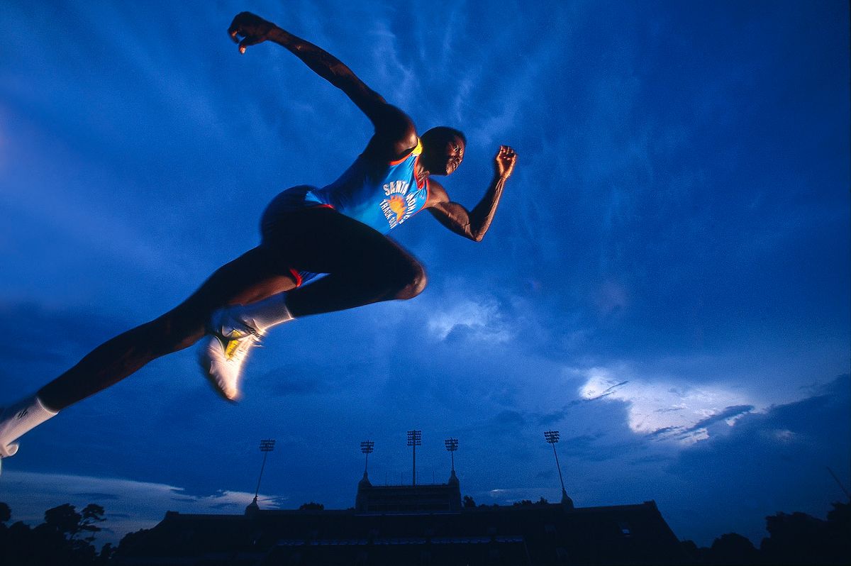 Walter Iooss Jr., Carl Lewis, Houston, TX, 1991, archival pigment print on paper, 23 ¼ × 29 inches. Asheville Art Museum. © Walter Iooss Jr.