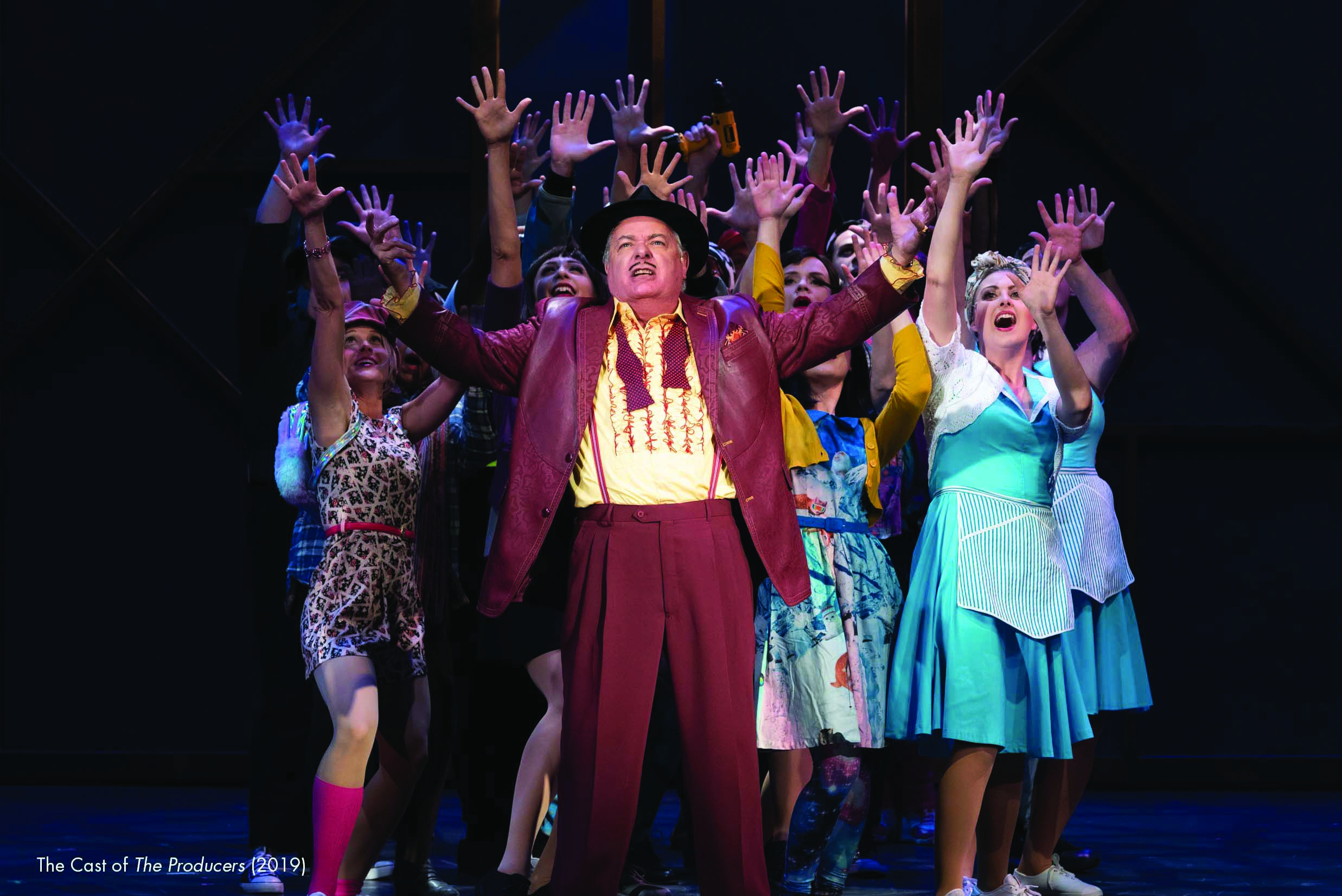 Michael Poisson (center) and the 2019 cast of "The Producers"