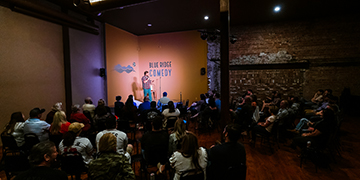 Shawn Carter performs at his comedy club.