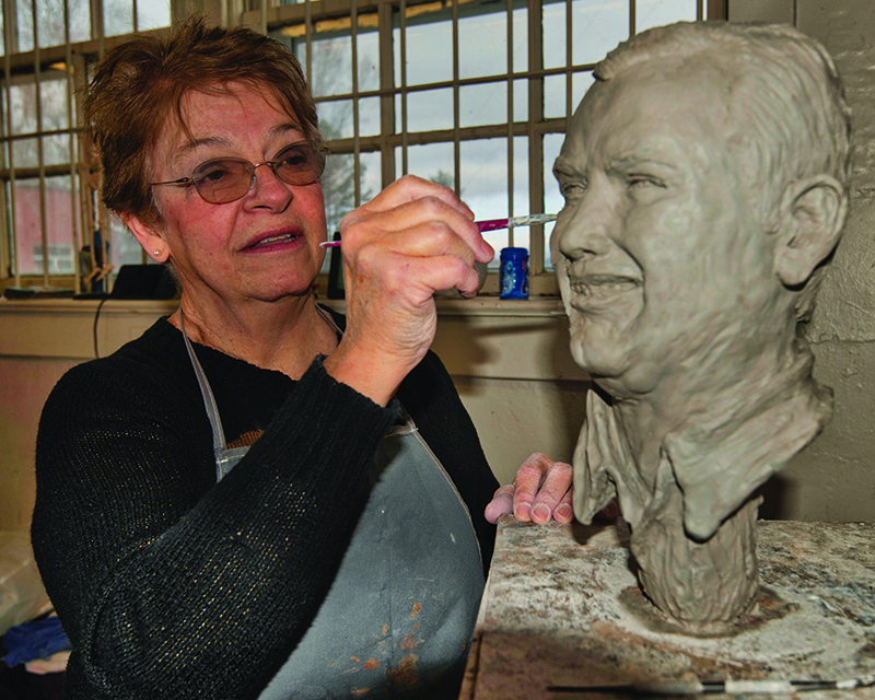 Helen French works on a new sculpture. (photo by David Grace)