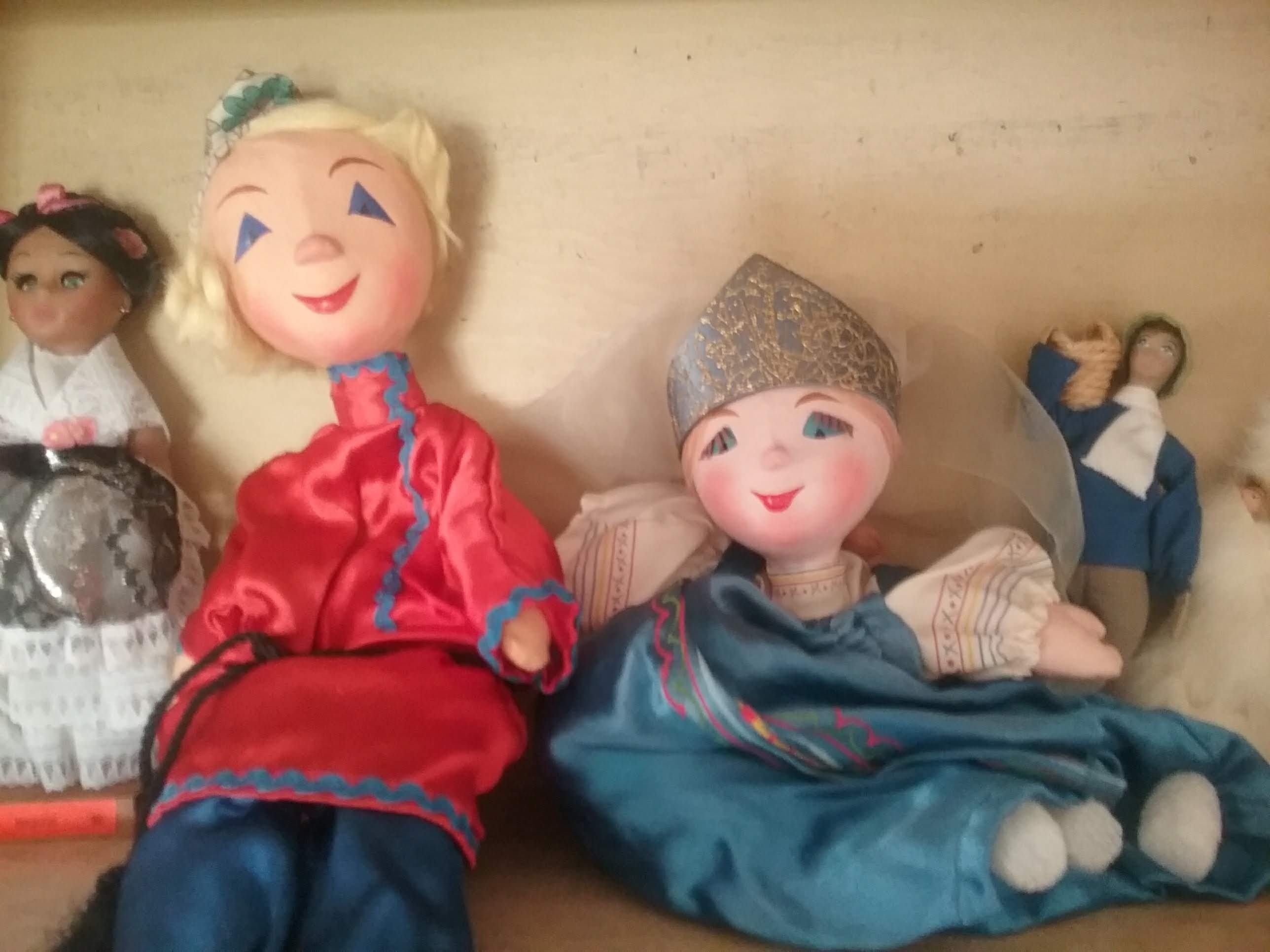 Some of the storytelling dolls that Pam Miller has collected in the Storytelling Resource Place
