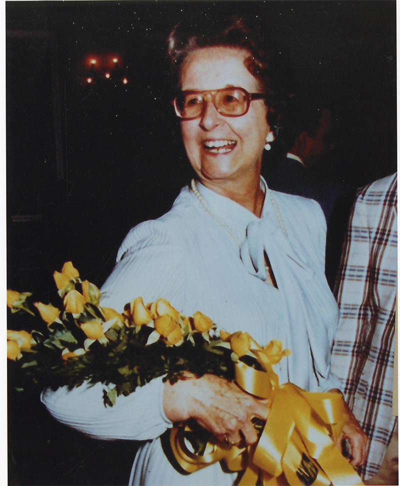 Constance Hardinge is seen with her yellow roses.