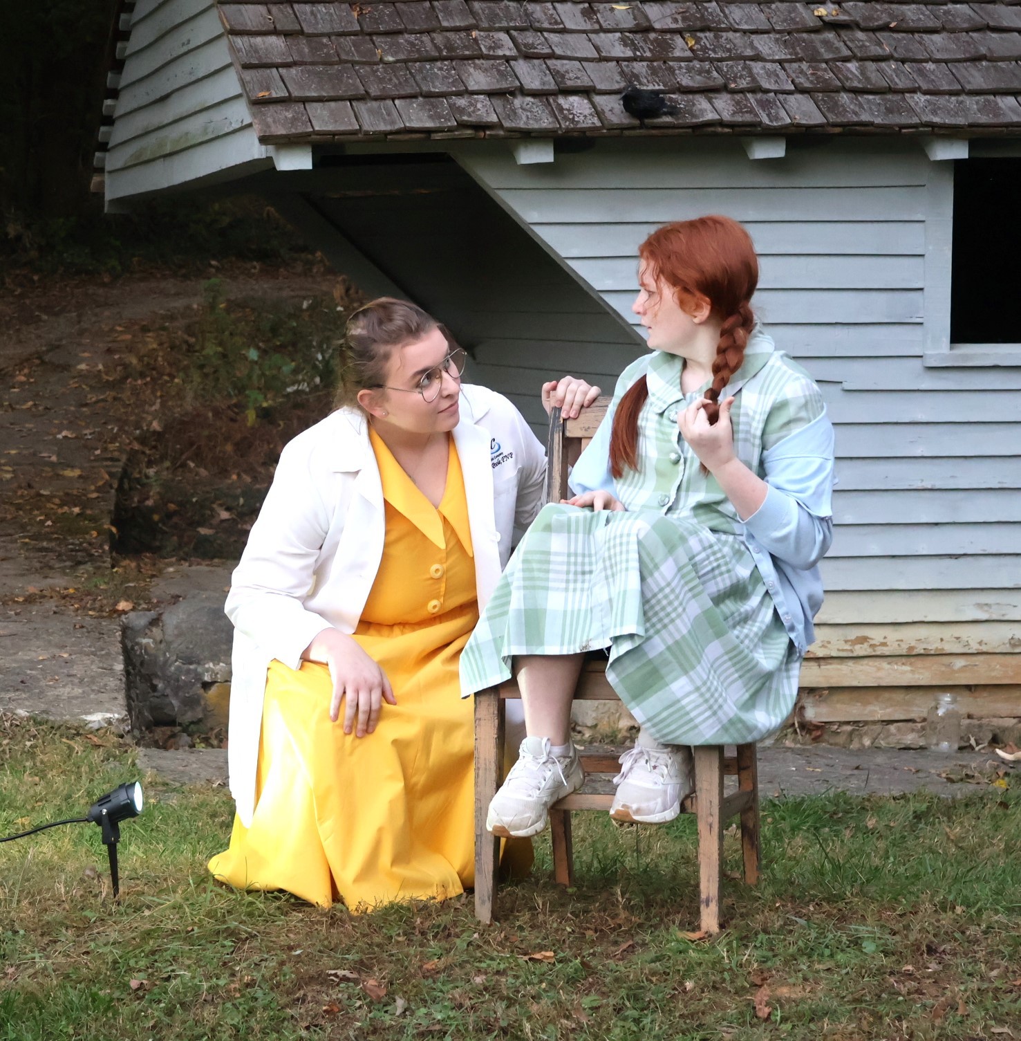 Two actors perform in a play during 'Edgar Allan Poe and Other Haunted Stories in the Woods' in 2024.